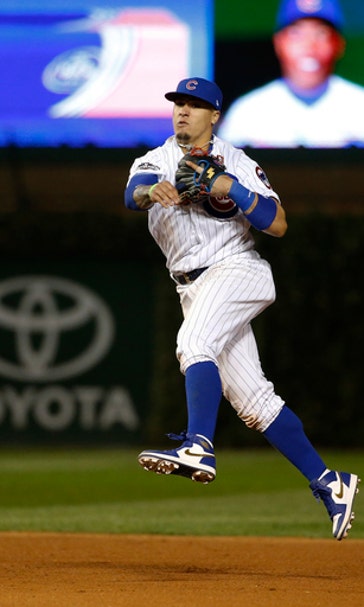 Lester, Baez help Cubs blank Giants 1-0 in NLDS opener